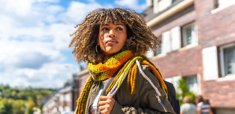 image of a student within campus grounds